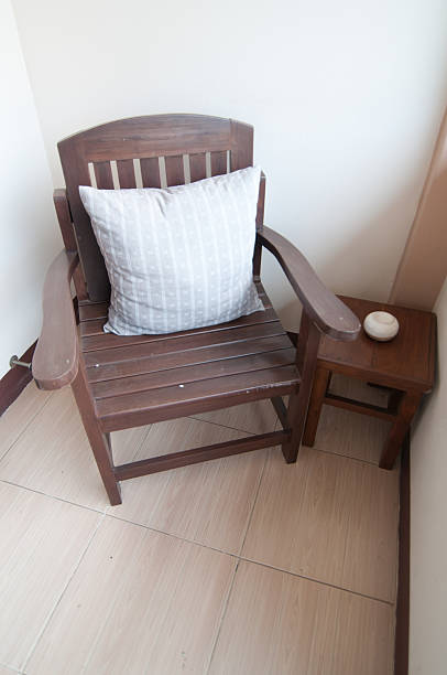 istock Pillows on a wood chair 469188132