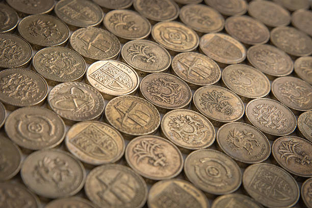 istock Shiny New Coin - Standing Out From The Crowd 469188959
