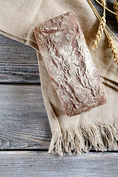 istock Whole Loaf of Bread on a sacking 469192438