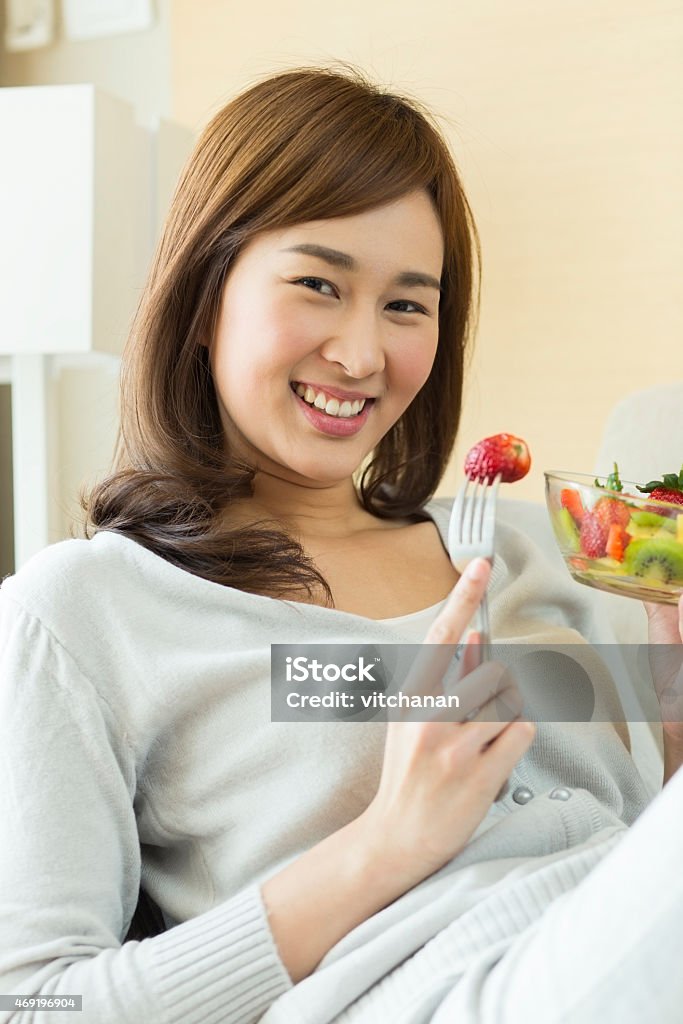 Asian woman is happy eating her fruit salad [size=12]Asian woman is happy eating her fruit salad
[/size]

[url=http://www.istockphoto.com/search/portfolio/7795483/?facets=%7B%2225%22%3A%226%22%7D#fef7e09][img]http://goo.gl/JLoF3[/img][/url] 2015 Stock Photo