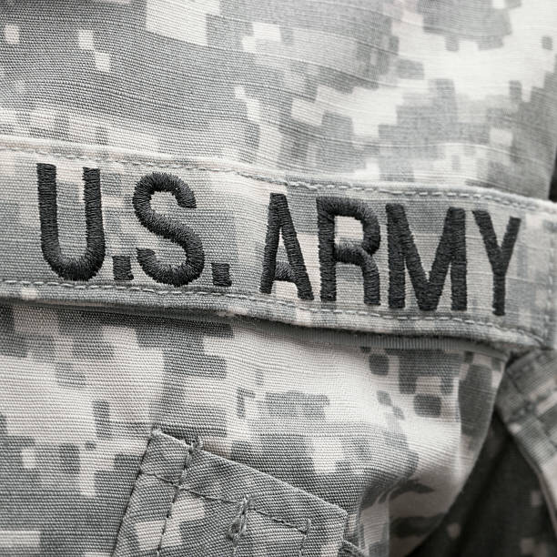 istock USA flag and US Army patch on solder's uniform 469197678