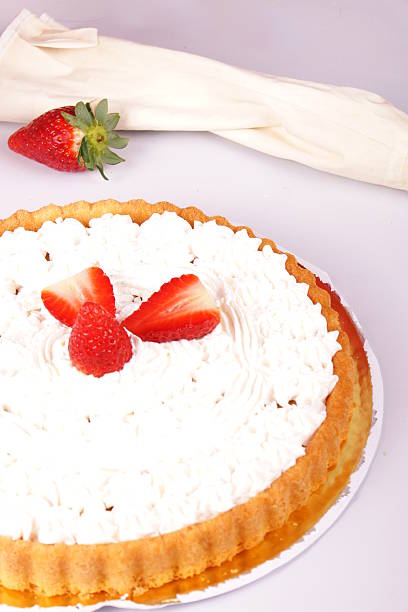 istock Portrait of a woman decorating a cake 469200048