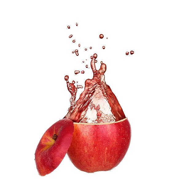 istock Apple juice splashing isolated on white 469202104