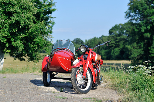 old red sidecar on the road