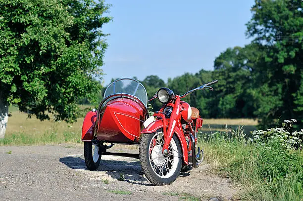 old red sidecar on the road