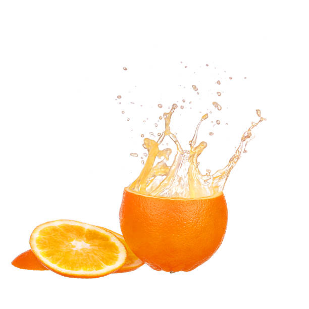 istock Orange juice splashing isolated on white 469204678