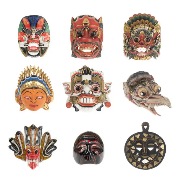 Photo of Group of balinese mask isolated on white