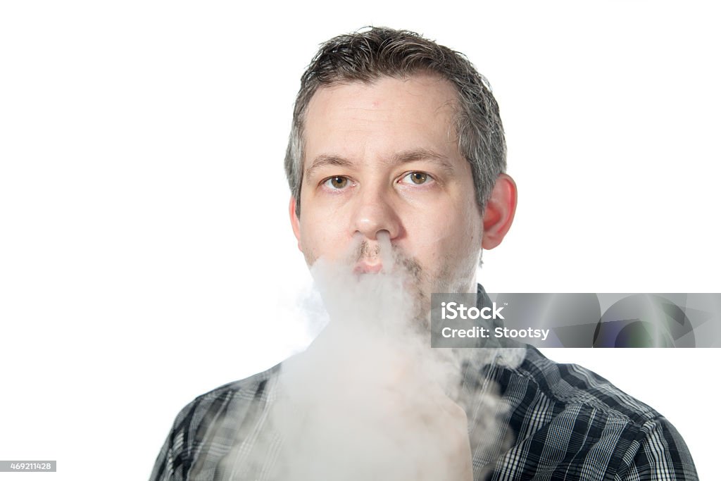 Man exhaling smoke picture of a man exhaling smoke 2015 Stock Photo