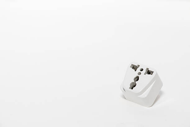 White plug socket connector on white background stock photo