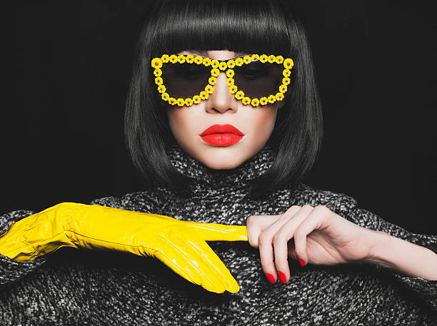 スタイリッシュな女性 - elegance yellow glasses eyewear ストックフォトと画像