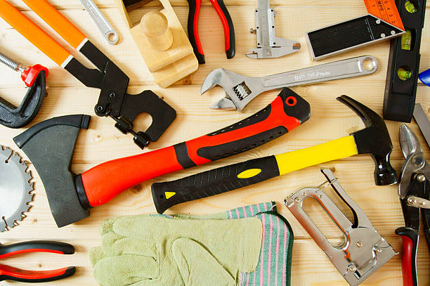 istock Many working tools on a wooden background 469212102