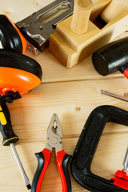 istock Many working tools on a wooden background 469212116