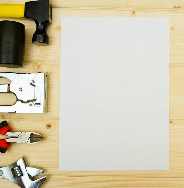 istock Paper for notes and set of working tools on wooden 469212256
