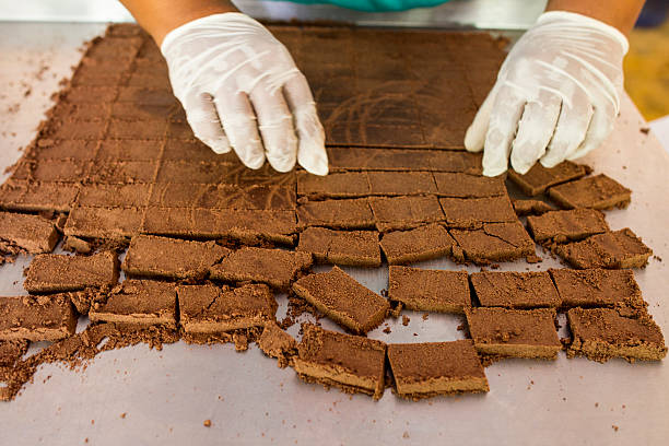 Cutting artisan Chocolate stock photo