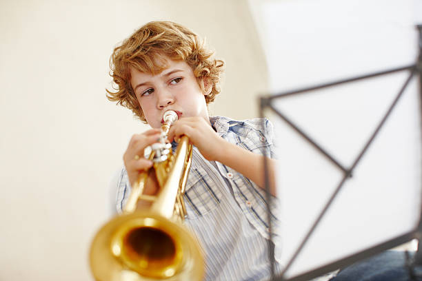 istock Showing some great technique with his trumpet 469215048