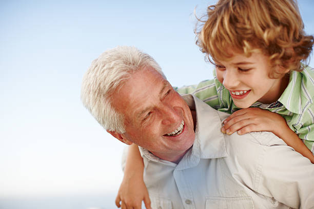 istock There's always a laugh when grandpa's around 469215292