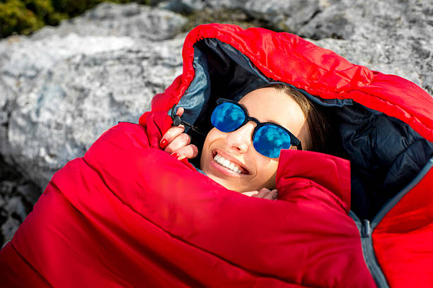 istock Woman in sleeping bag on the mountain 469217900