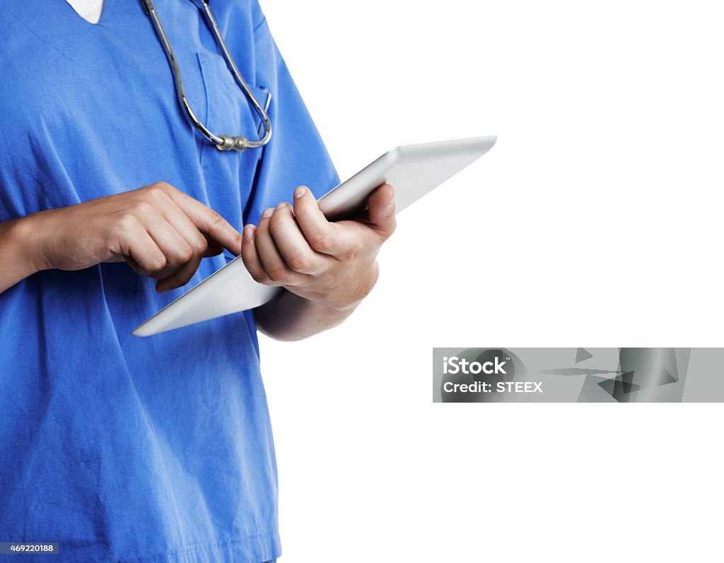 Medical records on the move Cropped studio shot of a doctor using a digital tablet against a white backgroundhttp://195.154.178.81/DATA/i_collage/pu/shoots/785498.jpg 2015 Stock Photo