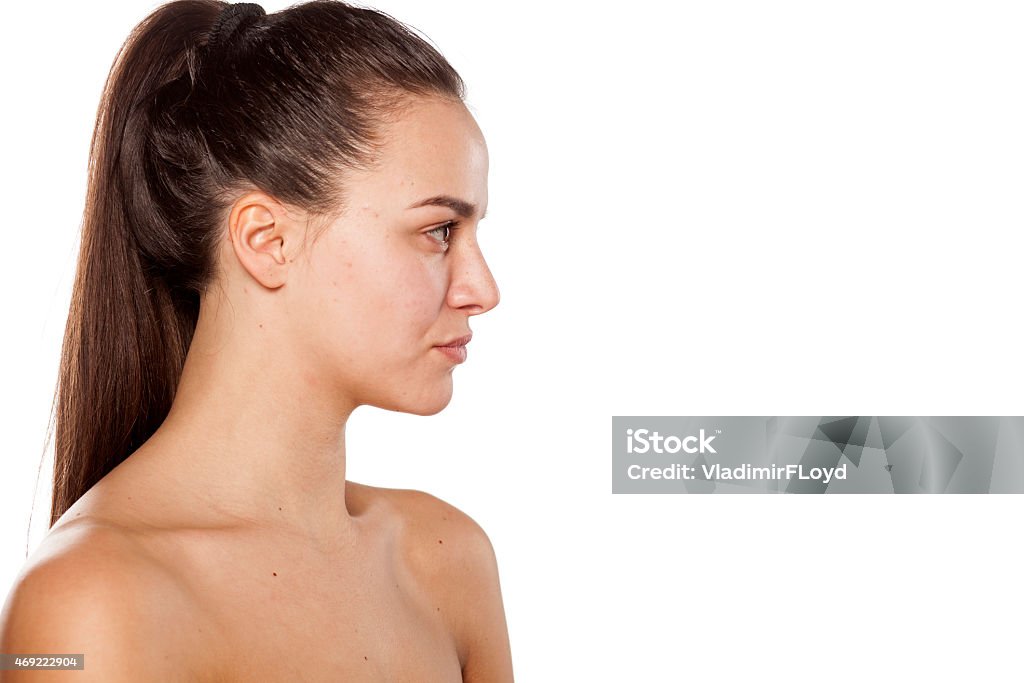 Profile of a woman Profile of a young woman on a white background People Stock Photo