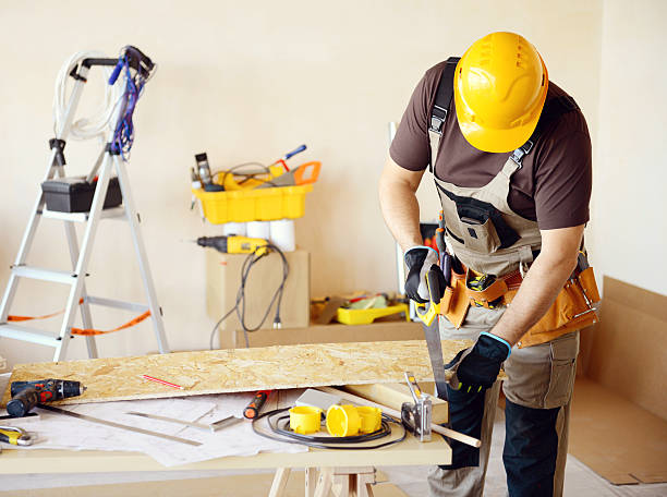 istock Male carpenter in working clothes in a construction workshop 469223992