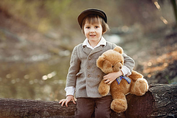 istock Adorable little boy with his teddy bear friend 469224390