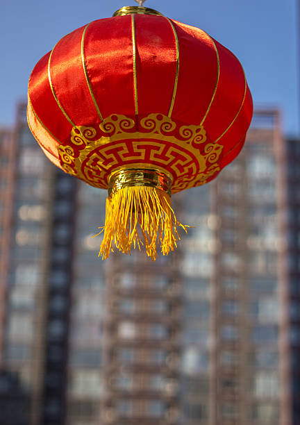 istock red lantern and high buildings 469225172