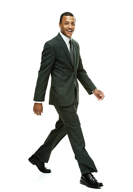 istock Cheerful businessman walking 469225944