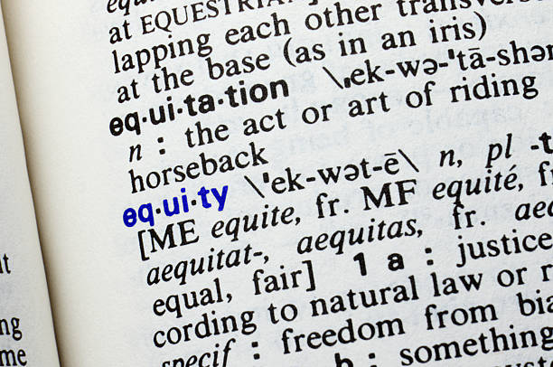 istock Equity. Closeup of dictionary word entry. 469226344