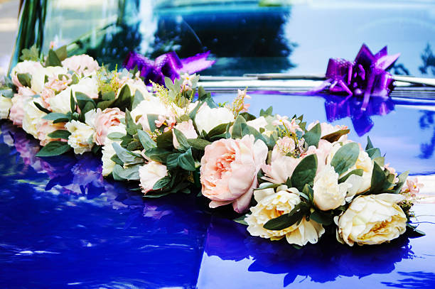 istock Wedding flowers by the car 469230230