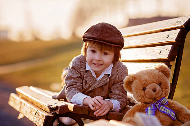 istock Adorable little boy with his teddy bear friend 469230604