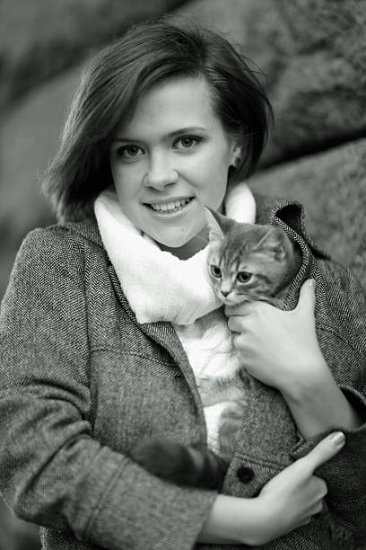 istock girl with a kitten 469231724