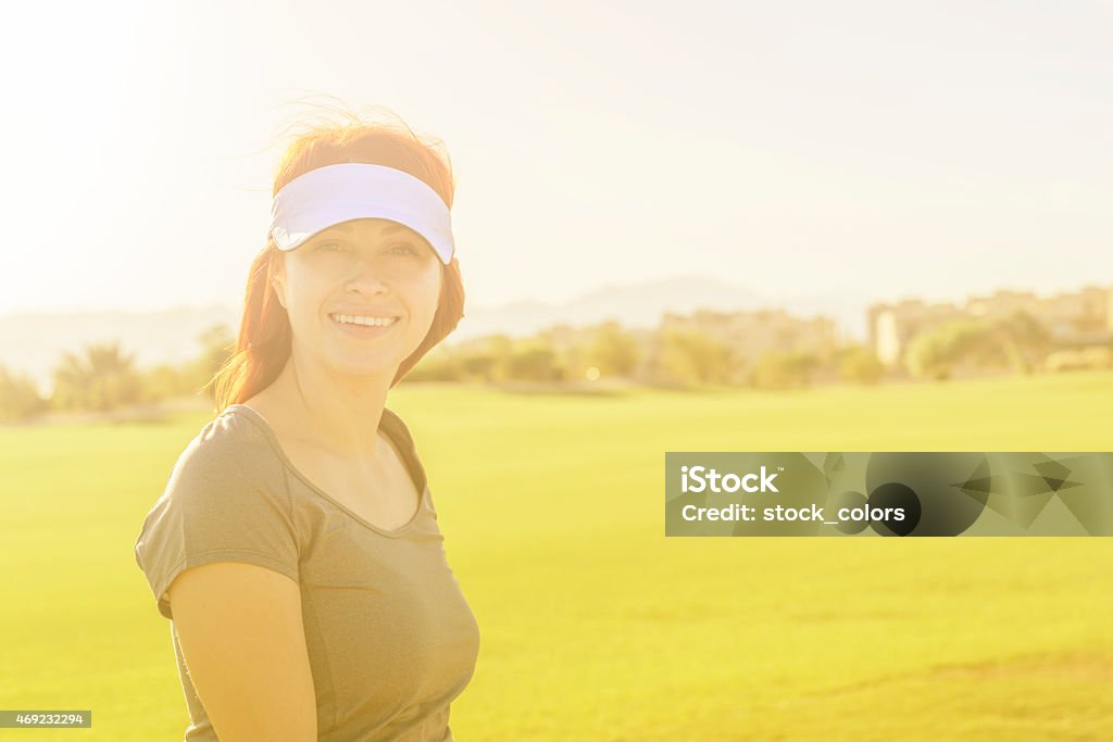 woman on golf course happy sportive woman on golf course in summer season. 30-39 Years Stock Photo