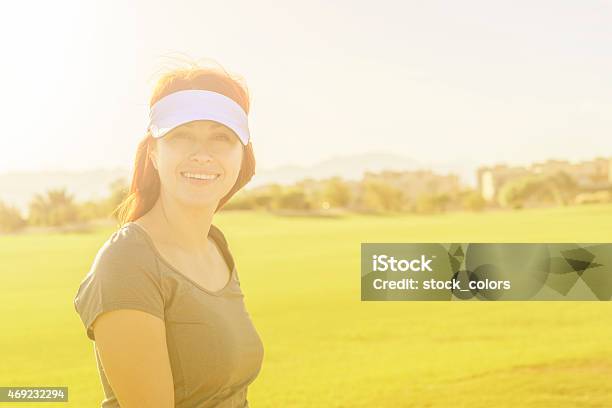 Woman On Golf Course Stock Photo - Download Image Now - 30-39 Years, Adult, Adults Only