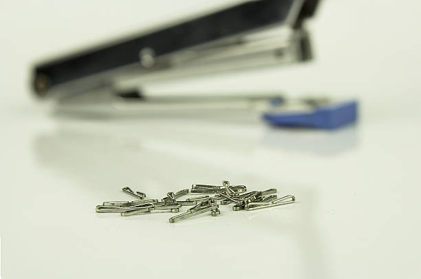 istock Staples and Stapler on white background, isolated 469232838