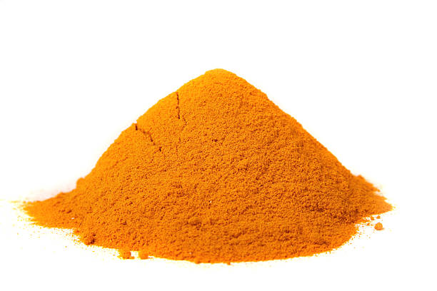istock pile of turmeric on  white background 469235190