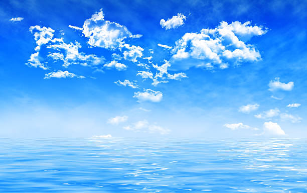 istock cumulus clouds on blue sky, with fog and water reflection, 469237992