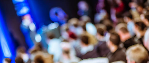istock Large Group of People Listening to a Presentation 469238032