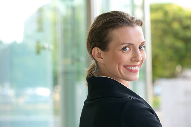 istock Career woman smiling outside 469240160