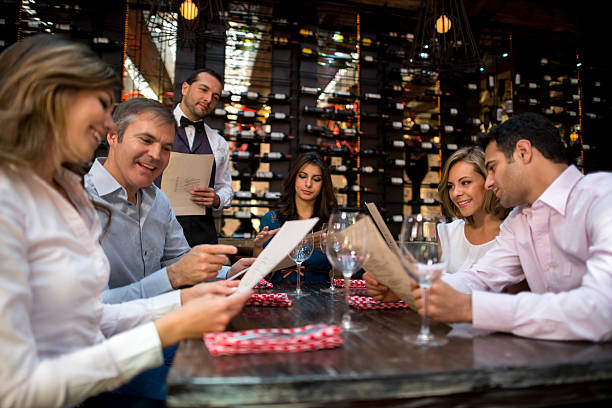 istock Group of friends at a restaurant 469240690