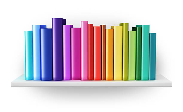 Rainbow themed hardcover bookshelf--white walls contrast
