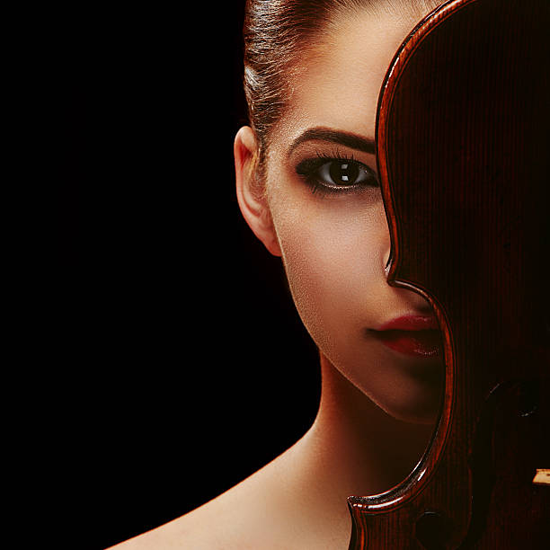 istock woman with violin 469241694