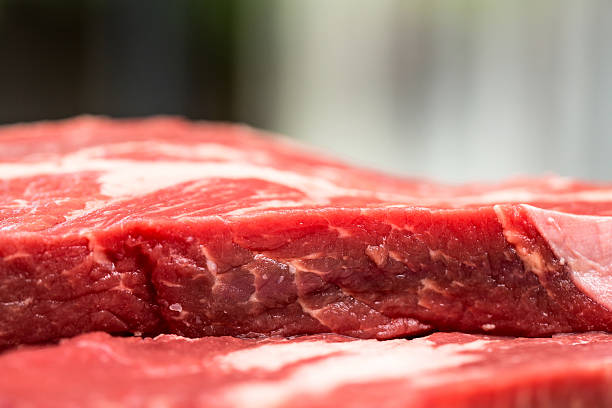 istock Fresh beef steaks on wooden board 469245826