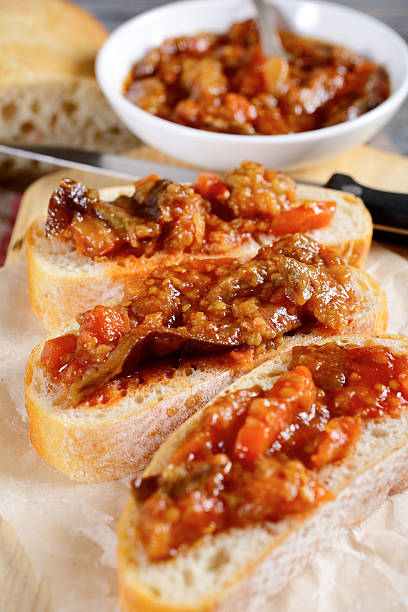 istock Three slices of bruschetta with roasted eggplant 469245954