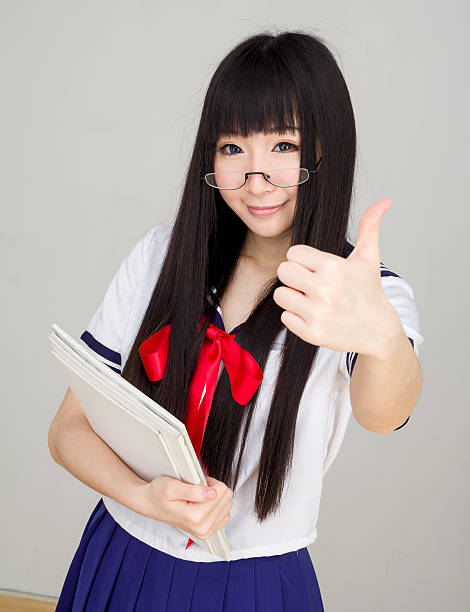 istock asian girl student in school uniform thumb up 469246516