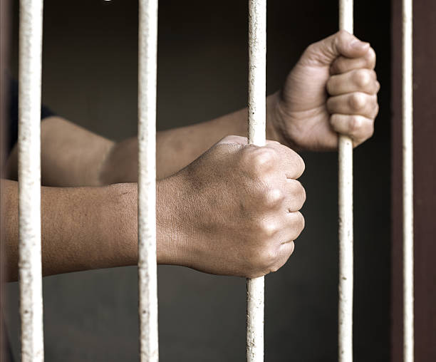 istock Hands of man prisoner 469246976