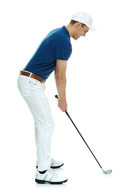 istock Smiling male golfer swinging 469247458