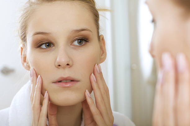 istock woman reflexion in mirror 469250130