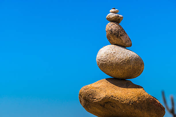 istock Sand stones in a zen pile formation 469250146