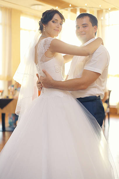 istock bride and groom at a wedding in summer nature 469250578