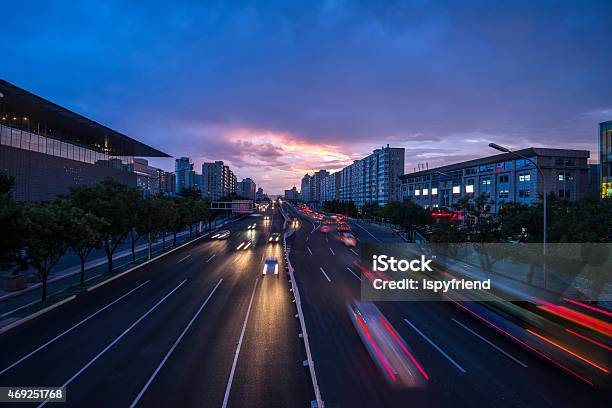 Urban Highway Traffic At Night Stock Photo - Download Image Now - 2015, Activity, Architecture